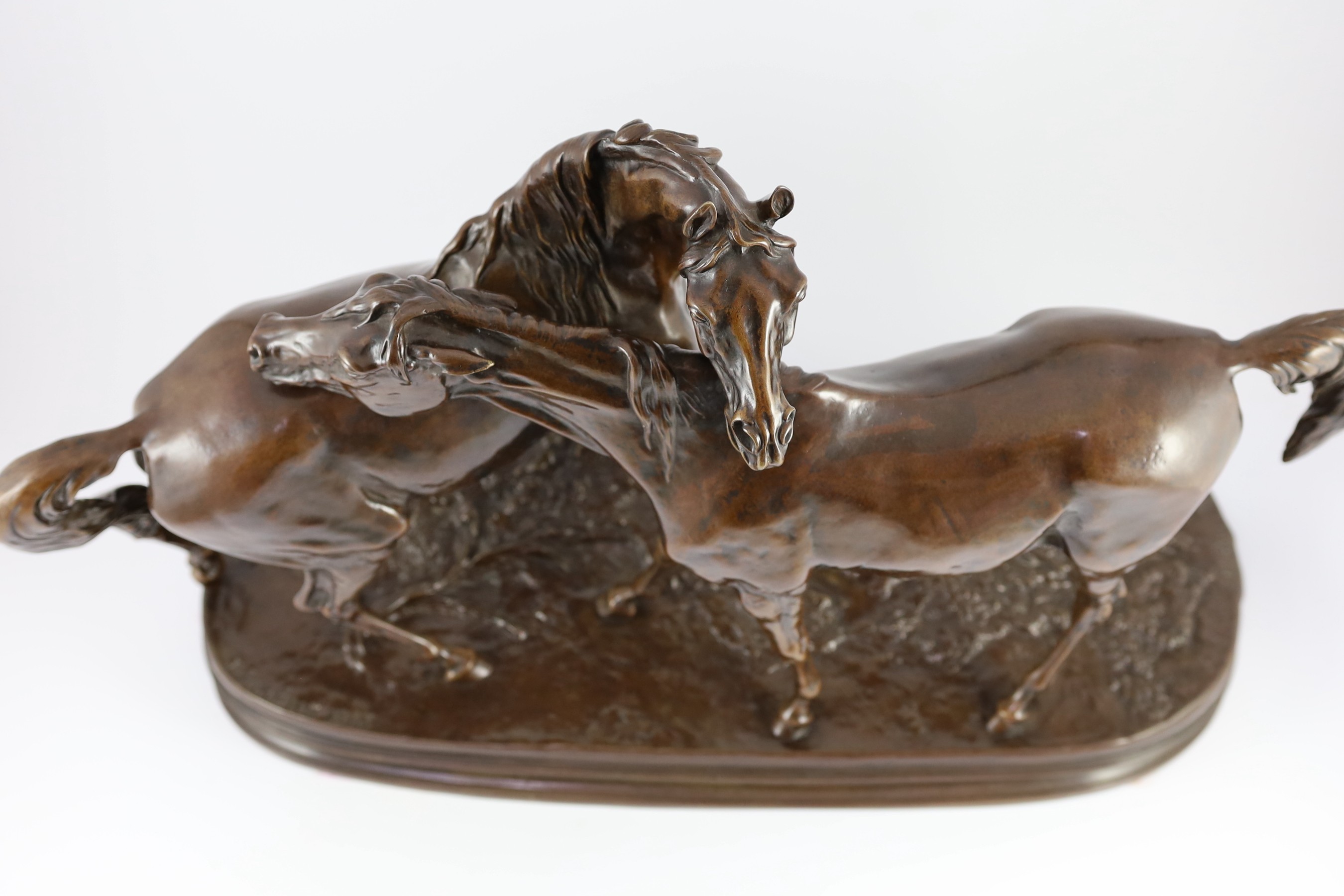 After Pierre Jules Mene (French, 1810-1879). A bronze group; L'Accolade (The Embrace), 44cm high 68cm long